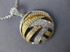 ESTATE .86CT DIAMOND 18KT TRI COLOR GOLD 3D CIRCULAR CRISS CROSS FUN PENDANT