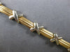 ESTATE 14KT WHITE AND YELLOW GOLD 3D SOLID X LOVE BRACELET