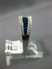 1.29CT DIAMOND & AAA SAPPHIRE 18KT WHITE GOLD ROUND & BAGUETTE ANNIVERSARY RING