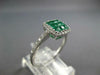 .84CT DIAMOND & AAA EMERALD 18KT WHITE GOLD 3D ROUND & PRINCESS SQUARE FUN RING