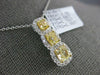 ESTATE 1.68CT WHITE & FANCY YELLOW DIAMOND 18KT 2 TONE GOLD HALO 3 STONE PENDANT