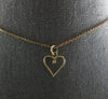 ESTATE SMALL .01CT DIAMOND 14KT YELLOW GOLD OPEN HEART SOLITAIRE PENDANT 28172