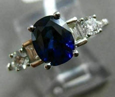 2.27CT ROUND & EMERALD DIAMOND & SAPPHIRE 18KT WHITE GOLD OVAL ENGAGEMENT RING