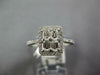 WIDE .83CT DIAMOND 18KT WHITE GOLD ROUND & BAGUETTE RECTANGULAR HALO LOVE RING