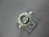 WIDE .55CT DIAMOND 18KT WHITE GOLD BEZEL ROUND HALO SEMI MOUNT ENGAGEMENT RING