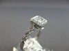 .41CT DIAMOND 14KT WHITE GOLD 3D ROUND & BAGUETTE INVISIBLE FILIGREE LOVE RING
