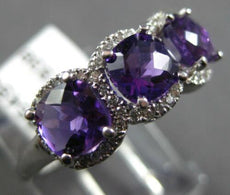 1.57CT DIAMOND & AAA AMETHYST 14KT WHITE GOLD CUSHION & ROUND 3 STONE HALO RING