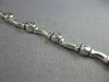.39CT DIAMOND 14KT WHITE GOLD 3D ETOILE MATTE & SHINY MULTI WAVE TENNIS BRACELET