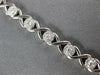 ESTATE .89CT DIAMOND 14KT WHITE GOLD 3D ROUND CLASSIC XO TENNIS BRACELET