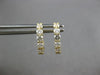 ESTATE .62CT DIAMOND 18KT YELLOW GOLD ROUND 5 STONE SHARED PRONG HUGGIE EARRINGS