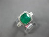 1.66CT DIAMOND & AAA EMERALD 18KT WHITE GOLD 3D CUSHION & ROUND ENGAGEMENT RING