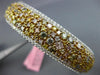WIDE GIA 8.39CT FANCY COLOR DIAMOND 18KT WHITE GOLD 3D MULTI ROW CLUSTER BANGLE