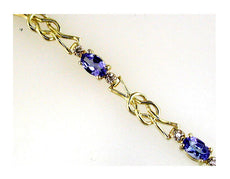 1.78CT DIAMOND & AAA TANZANITE 14K YELLOW GOLD 3 STONE LOVE KNOT TENNIS BRACELET