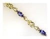 1.78CT DIAMOND & AAA TANZANITE 14K YELLOW GOLD 3 STONE LOVE KNOT TENNIS BRACELET