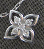 ESTATE .10CT DIAMOND 14KT WHITE GOLD 3D CLASSIC FLOWER STAR FLOATING PENDANT