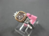 GIA 1.49CT WHITE & PINK DIAMOND 18KT WHITE & ROSE GOLD 3 STONE ENGAGEMENT RING
