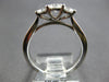 .64CT DIAMOND 18KT WHITE GOLD ROUND 3 STONE PAST PRESENT FUTURE ENGAGEMENT RING