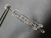 LONG 1.25CT DIAMOND 14KT WHITE GOLD ROUND & BAGUETTE HORSESHOE HANGING EARRINGS