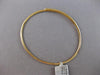 LARGE .53CT DIAMOND 18KT YELLOW GOLD CRISS CROSS FLEXIBLE LOVE BANGLE BRACELET