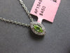 .16CT DIAMOND & AAA PERIDOT 14KT WHITE GOLD MARQUISE SHAPE HALO FLOATING PENDANT