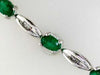 5.20CT DIAMOND & AAA EMERALD 14KT WHITE GOLD 3D OVAL & BAGUETTE TENNIS BRACELET