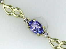 2.35CT DIAMOND & AAA TANZANITE 14KT YELLOW GOLD 3D OVAL & ROUND TENNIS BRACELET