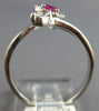 .52CT DIAMOND & AAA RUBY 18KT WHITE GOLD ROUND & MARQUISE CRISS CROSS FUN RING