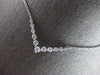 .59CT DIAMOND 14KT WHITE GOLD 3D GRADUATING V SHAPE SHARED PRONG LOVE NECKLACE