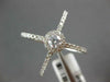 ESTATE LARGE .63CT DIAMOND 14KT WHITE GOLD ROUND HALO CRISS CROSS INFINITY RING