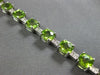 17.46CT DIAMOND & AAA PERIDOT 14KT WHITE GOLD 3D CUSHION & ROUND TENNIS BRACELET