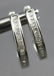 ESTATE .20CT DIAMOND 14KT WHITE GOLD 3D BAGUETTE CHANNEL OVAL HANGING EARRINGS