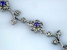 4.25CT DIAMOND & AAA TANZANITE 14KT 2 TONE GOLD PRINCESS & ROUND TENNIS BRACELET