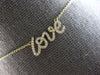 ESTATE .16CT DIAMOND 14KT YELLOW GOLD 3D CLASSIC ROUND LOVE SCRIPT FUN NECKLACE