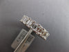 LARGE 6.07CT DIAMOND 18KT WHITE GOLD EMERALD CUT SHARED PRONG ANNIVERSARY RING