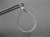 ESTATE LARGE 1.25CT DIAMOND 18KT WHITE GOLD TEAR DROP SIDEWAYS HANGING EARRINGS