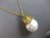 LARGE .10CT DIAMOND & AAA SOUTH SEA PEARL 18KT YELLOW GOLD MULTI FLOWER PENDANT