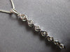 .65CT DIAMOND 18KT WHITE GOLD 3D ROUND SHARED PRONG JOURNEY BAR FLOATING PENDANT