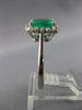 2.16CT DIAMOND & AAA EMERALD 14KT WHITE GOLD 3D ROUND & BAGUETTE ENGAGEMENT RING
