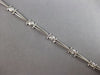 .26CT DIAMOND 14KT WHITE GOLD ROUND BEZEL ETOILE TRIANGULAR FUN TENNIS BRACELET