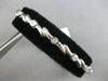 ESTATE .50CT DIAMOND 14K WHITE GOLD BEZEL ETOILE CRISS CROSS FUN TENNIS BRACELET