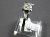 .50CT DIAMOND 18KT WHITE GOLD PRINCESS & BAGUETTE 3D INVISIBLE ENGAGEMENT RING