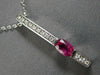 1.22CT DIAMOND & AAA RUBY 14KT WHITE GOLD OVAL & ROUND BAR LOVE FLOATING PENDANT