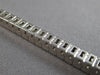 ESTATE 5.42CT DIAMOND 14KT WHITE GOLD PRINCESS CHANNEL INVISIBLE TENNIS BRACELET