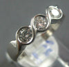 ESTATE .30CT DIAMOND 18KT WHITE GOLD 3D CLASSIC 3 STONE ROUND INFINITY LOVE RING