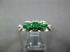 .91CT DIAMOND & AAA EMERALD 18KT 2 TONE GOLD OVAL & ROUND 3 STONE HALO LOVE RING