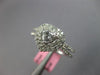 .95CT DIAMOND 18KT WHITE GOLD 3D HEART SHAPE & ROUND DOUBLE HALO ENGAGEMENT RING