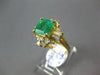 ESTATE 3.20CT DIAMOND & AAA EMERALD 18KT WHITE GOLD ROUND & BAGUETTE FLOWER RING