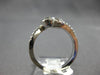 ESTATE .68CT DIAMOND 14KT WHITE GOLD CLASSIC BEZEL 2 STONE CRISS CROSS LOVE RING