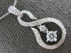 LARGE .52CT DIAMOND 18KT WHITE GOLD SOLITAIRE INFINITY LOVE FUN FLOATING PENDANT