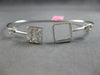 WIDE .59CT DIAMOND 18K WHITE GOLD 3D ROUND & BAGUETTE INVISIBLE BANGLE BRACELET